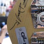 You need to look on the back of the headstock for Tom's signature decal