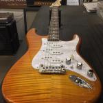 Comanche in Honeyburst over flame maple on swamp ash-rw board