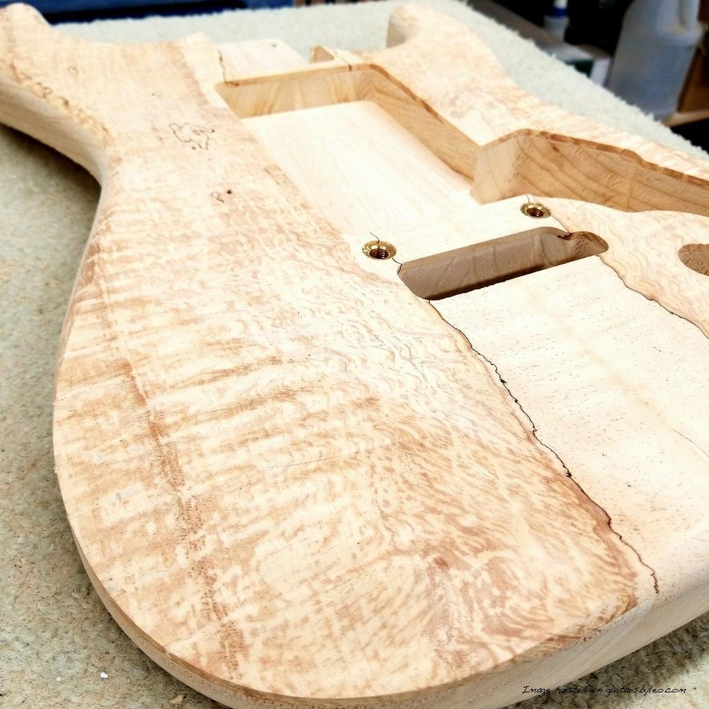 Legacy has a figured Spalted Alder top over Ash