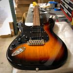 Tribute Series Legacy Lefty in 3-Tone Sunburst over swamp ash