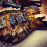 Buckeye Burl topped ASAT Bass with a Soft Blackburst finish