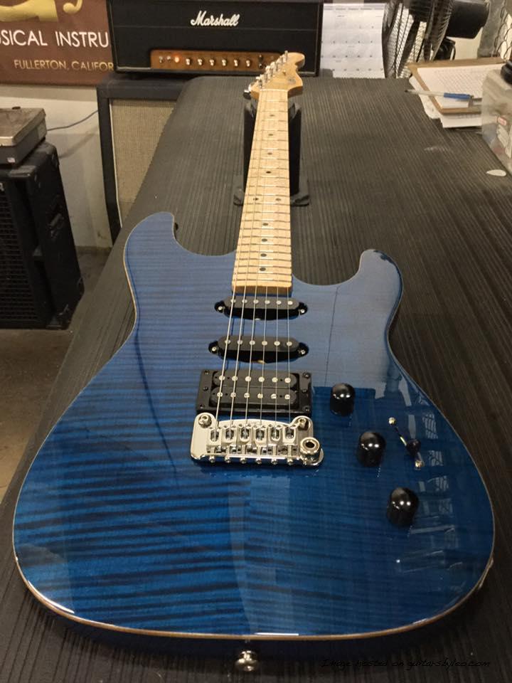 Legacy HSS RMC in Clear Blue over flame maple on swamp ash birdseye maple fretboard