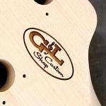 Closeup of laser etched G&L Custom Shop logo