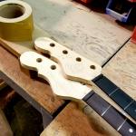 Two Custom Shop bass necks in the woodshop