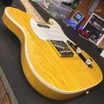 AC in Lemon Drop on Swamp Ash top white binding body close up