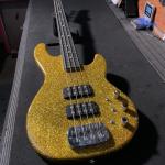 L•2000 in Gold Metal Flake over swamp ash