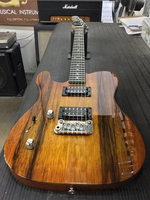 Lefty AD in Honeyburst on black limba on mahogany