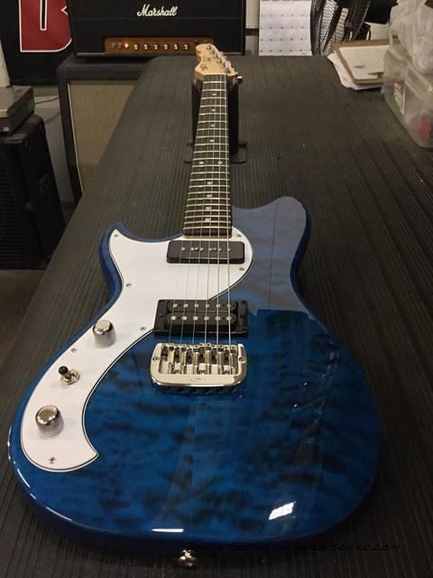 Lefty Fallout in Clear Blue over quilt maple on swamp ash