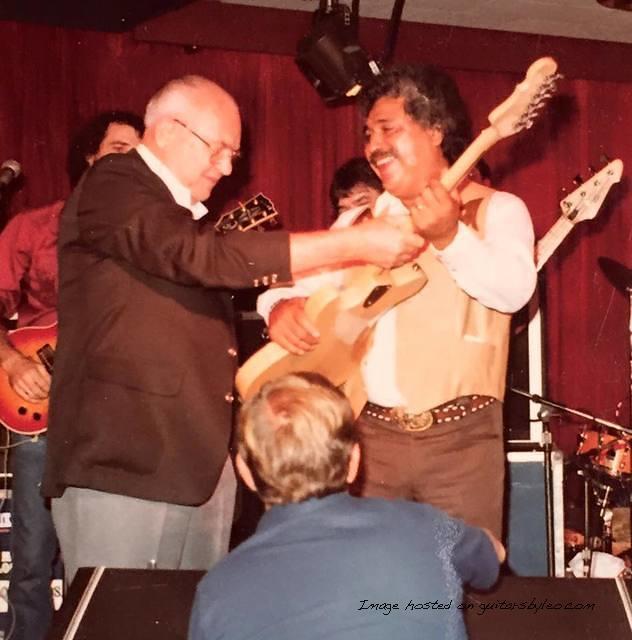 1982 - Leo Fender gives one of his new G amp L guitars to the legendary Freddy Fender
