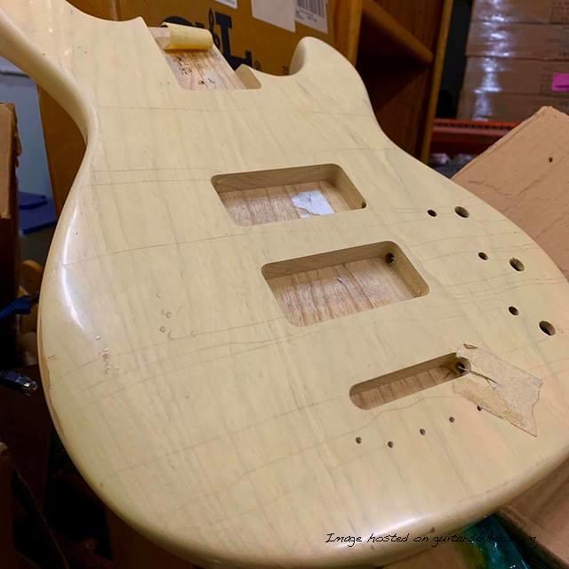 Found a 2009 aged nitro blonde swamp ash L-2000 body