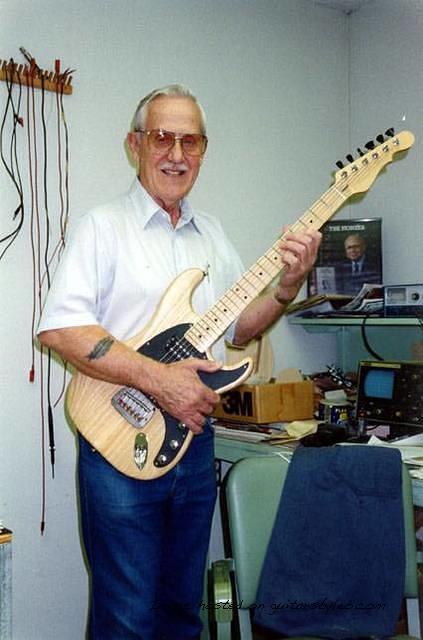George Fullerton holding Leo s last instrument