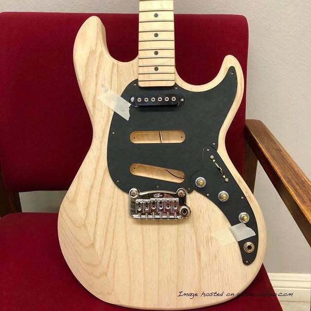 March 26 2018-test fitting laser cut Skyhawk pickguard and control plate shapes