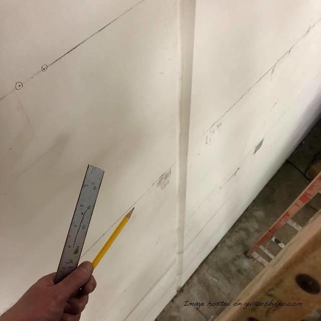 marking for guitar hangers in the expansion of Leo s Lounge