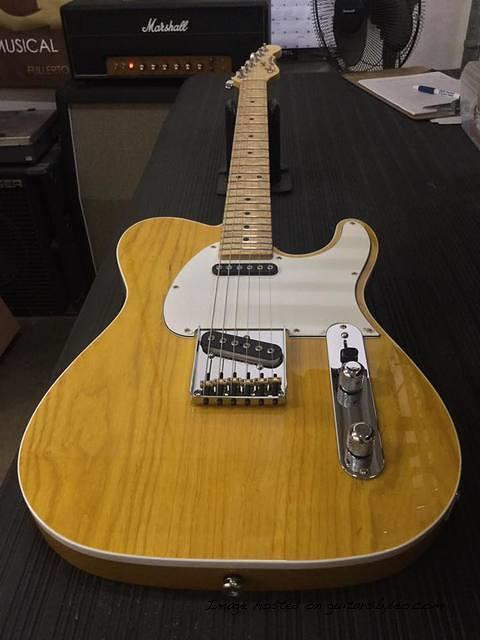 AC in Lemon Drop on Swamp Ash top white binding