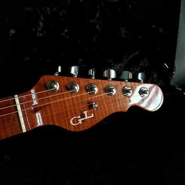ASAT Classic done up in Trans Purple over Buckeye Burl with a natural Okoume back-3
