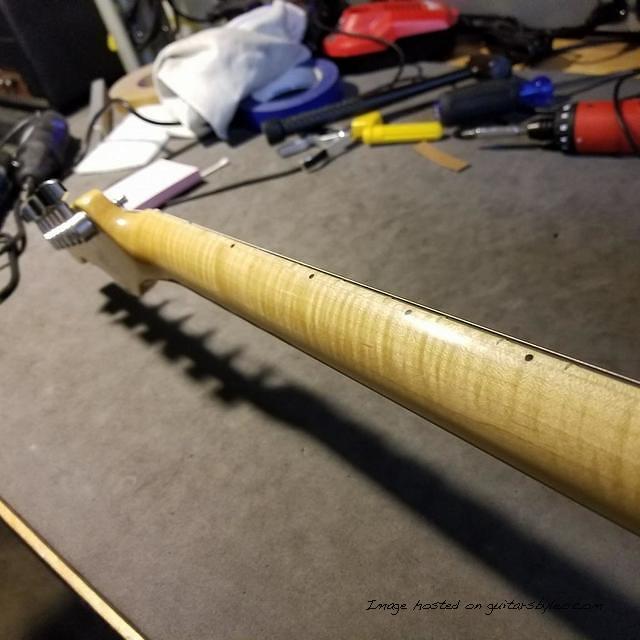 Check out the subtle hint of flame AKA ghost flame on the neck of this ASAT Classic
