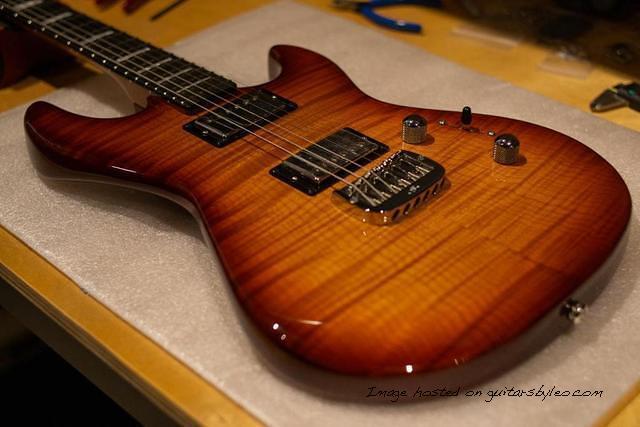 Custom Shop Skyhawk HH RMC in Old School Tobacco Sunburst over a 3A Flame Maple top1 