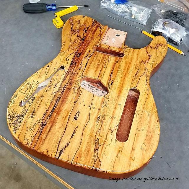 Front and back detail of this ASAT Classic Semi-Hollow with a Spalted Maple top over Okoume-front