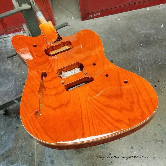 G amp L Custom Shop Doheny Semi-Hollow in Clear Orange with natural wood binding