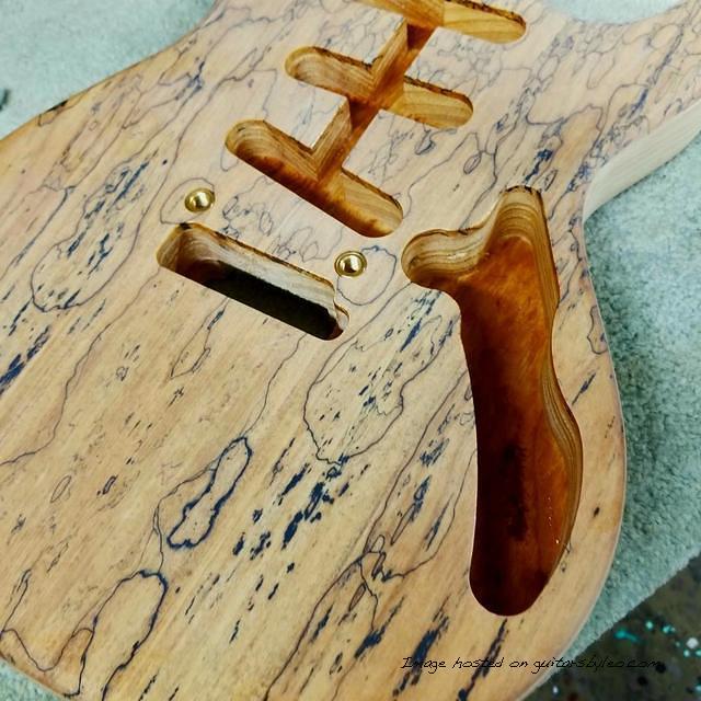 Love that Spalted Maple top on this custom Skyhawk
