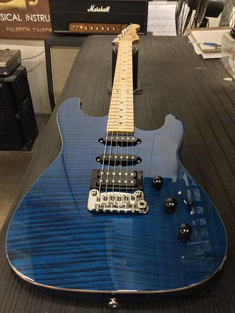 Legacy HSS RMC in Clear Blue over flame maple on swamp ash