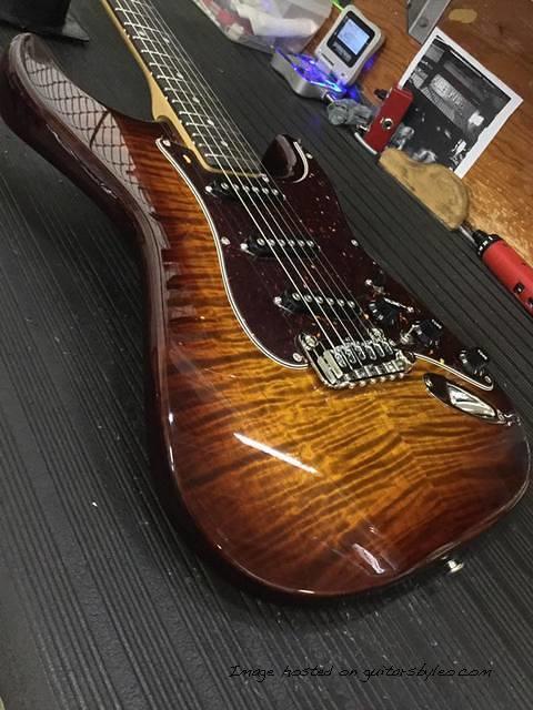 S-500 in Old School Tobacco Sunburst over flame maple on swamp ash body close up