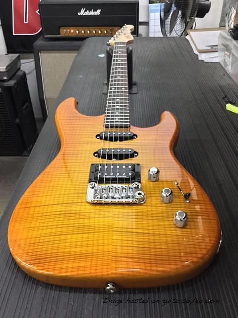 Legacy HSS RMC in Honeyburst over flame maple on swamp ash2