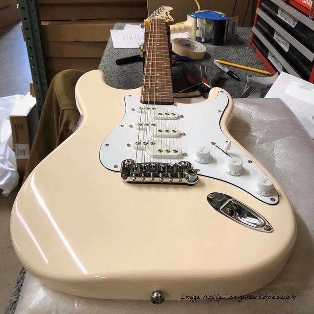 Tribute Series Comanche in Olympic White over mahogany matching headstock up top