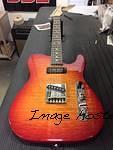 AC BB 90 in Cherryburst over quilt maple on swamp ash pickguard delete