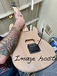 prototype Rampage 24 body with modified neck pocket depth and traditional surface-mount Kahler 2300 bridge