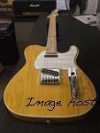 AC in Lemon Drop on Swamp Ash top white binding