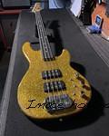 L 2000 in Gold Metal Flake over swamp ash