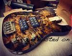 Buckeye Burl topped ASAT Bass with a Soft Blackburst finish