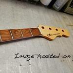 Custom Shop L-2000 neck has one of the most unique Caribbean Rosewood fingerboards