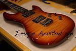 Custom Shop Skyhawk HH RMC in Old School Tobacco Sunburst over a 3A Flame Maple top1 