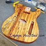 Front and back detail of this ASAT Classic Semi-Hollow with a Spalted Maple top over Okoume-front