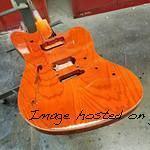 G amp L Custom Shop Doheny Semi-Hollow in Clear Orange with natural wood binding