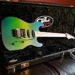 Invader in Green Burst Frost with a 3A Flame Maple neck-1