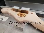 Jake s Custom Shop Legacy neck being laser engraved and serialized