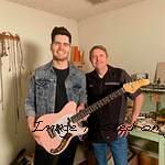 Johnny Gomez with his new G amp L Custom Shop Espada