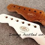 Quilted Maple logo and the other has a Mahogany inlaid logo