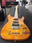 Legacy HSS RMC in Honeyburst over flame maple on swamp ash