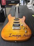 Legacy HSS RMC in Honeyburst over flame maple on swamp ash2