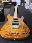 Legacy HSS RMC in Honeyburst over quilted maple on swamp ash