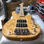 Tribute Series L-2000 in Natural Gloss over swamp ash