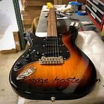 Tribute Series Legacy Lefty in 3-Tone Sunburst over swamp ash